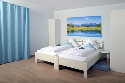 Ein Bett oder Betten in einem Zimmer der Unterkunft Pension Lerchenfeld