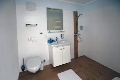 Ein Badezimmer in der Unterkunft Pension Lerchenfeld