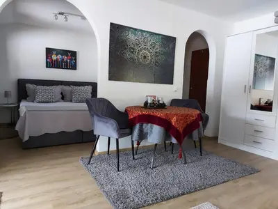 Ein Bett oder Betten in einem Zimmer der Unterkunft Sonniges Appartement am Tegernsee