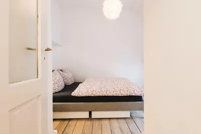 Ein Bett oder Betten in einem Zimmer der Unterkunft #1 AUGSBURG Altstadtjuwel