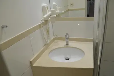 Ein Badezimmer in der Unterkunft Hotel Amba