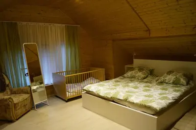 Ein Bett oder Betten in einem Zimmer der Unterkunft Gemütliches Haus mit Sauna im Voralpenland