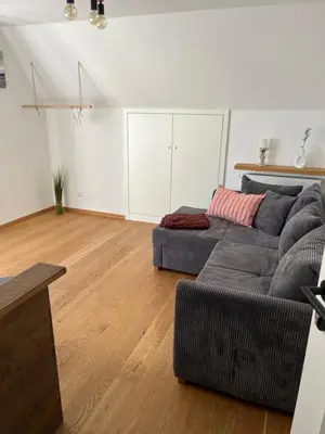 Ein Sitzbereich in der Unterkunft Fühl dich wie daheim