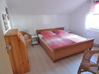 Ein Bett oder Betten in einem Zimmer der Unterkunft Ferienwohnung Bergidyll