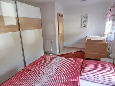 Ein Bett oder Betten in einem Zimmer der Unterkunft Ferienwohnung Bergidyll