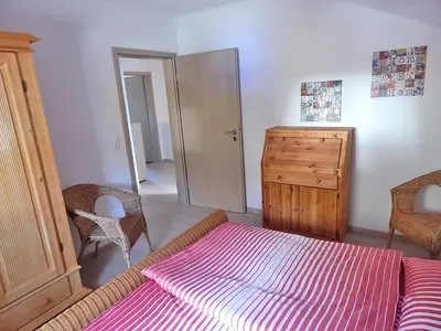 Ein Bett oder Betten in einem Zimmer der Unterkunft Ferienwohnung Bergidyll