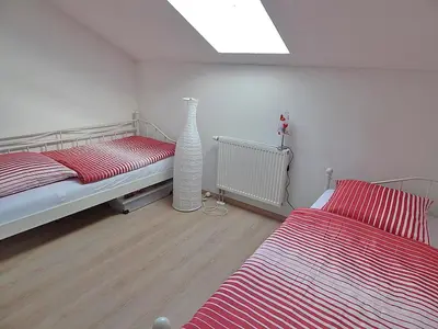 Ein Bett oder Betten in einem Zimmer der Unterkunft Ferienwohnung Bergidyll