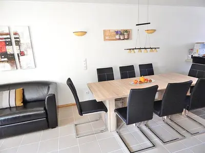 Ein Sitzbereich in der Unterkunft Ferienwohnung Bergidyll