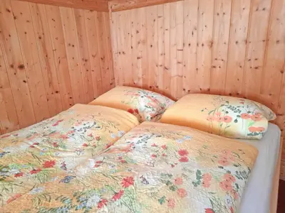 Ein Bett oder Betten in einem Zimmer der Unterkunft Ferienwohnung Spitzsteinblick