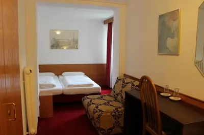 Ein Bett oder Betten in einem Zimmer der Unterkunft Hotel Montree