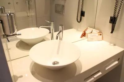 Ein Badezimmer in der Unterkunft Kult Hotel