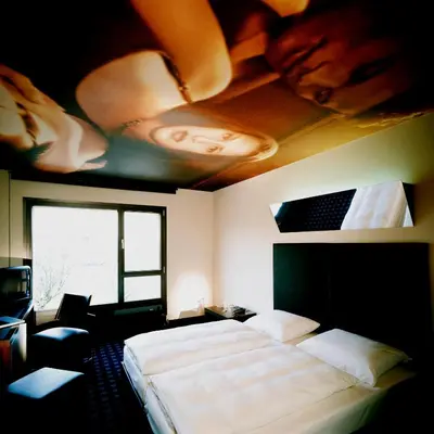 Ein Bett oder Betten in einem Zimmer der Unterkunft Kult Hotel