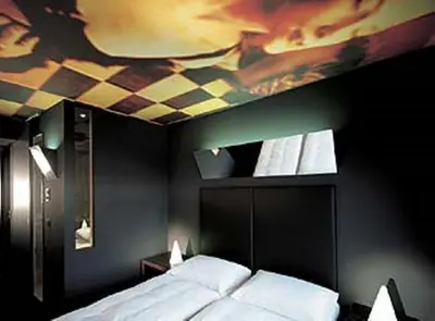 Ein Bett oder Betten in einem Zimmer der Unterkunft Kult Hotel