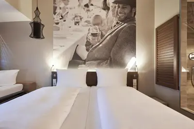 Ein Bett oder Betten in einem Zimmer der Unterkunft Hotel GIO