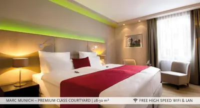 Ein Bett oder Betten in einem Zimmer der Unterkunft Marc München