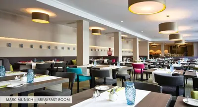 Ein Restaurant oder anderes Speiselokal in der Unterkunft Marc München
