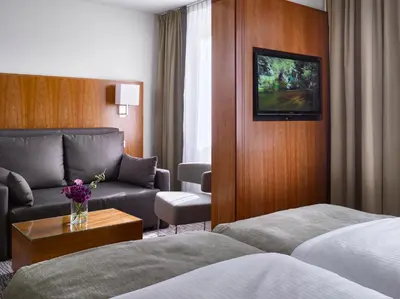 Ein Bett oder Betten in einem Zimmer der Unterkunft K+K Hotel am Harras