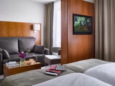 Ein Bett oder Betten in einem Zimmer der Unterkunft K+K Hotel am Harras