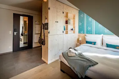 Ein Bett oder Betten in einem Zimmer der Unterkunft Marias Platzl
