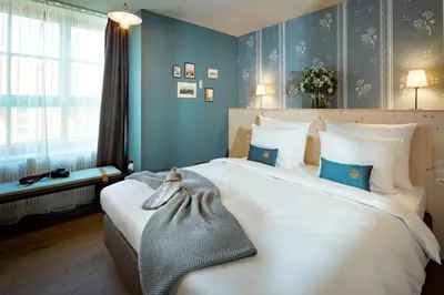 Ein Bett oder Betten in einem Zimmer der Unterkunft Marias Platzl