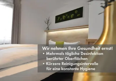 Ein Bett oder Betten in einem Zimmer der Unterkunft Hotel Perlach Allee by Blattl