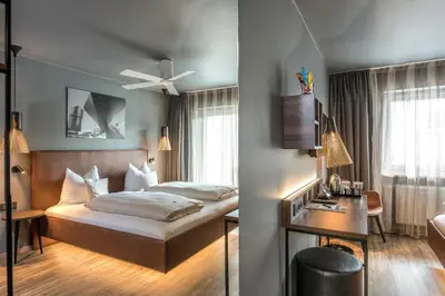 Ein Bett oder Betten in einem Zimmer der Unterkunft Bavaria Boutique Hotel