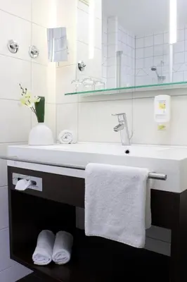 Ein Badezimmer in der Unterkunft AMBER ECONTEL
