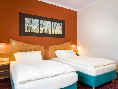 Ein Bett oder Betten in einem Zimmer der Unterkunft Mercure Hotel Ingolstadt