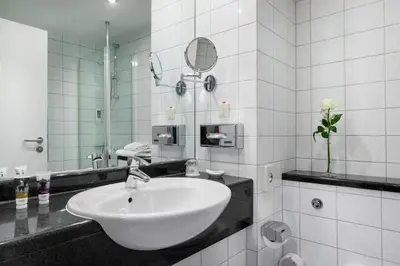 Ein Badezimmer in der Unterkunft Mercure Hotel Ingolstadt