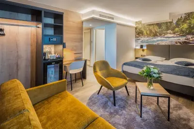 Ein Sitzbereich in der Unterkunft Best Western Hotel München Airport