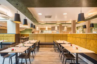 Ein Restaurant oder anderes Speiselokal in der Unterkunft Best Western Hotel München Airport