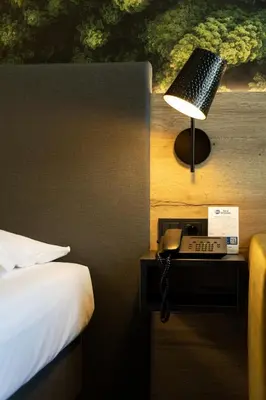 Ein Bett oder Betten in einem Zimmer der Unterkunft Best Western Hotel München Airport