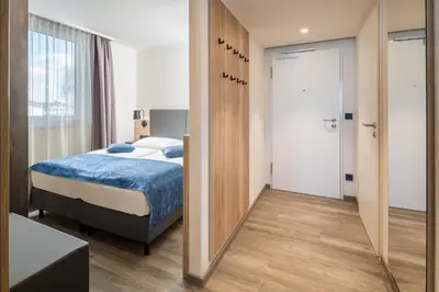 Ein Bett oder Betten in einem Zimmer der Unterkunft Best Western Hotel München Airport