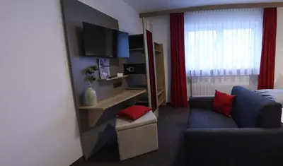 Ein Sitzbereich in der Unterkunft Gasthof zur Brücke