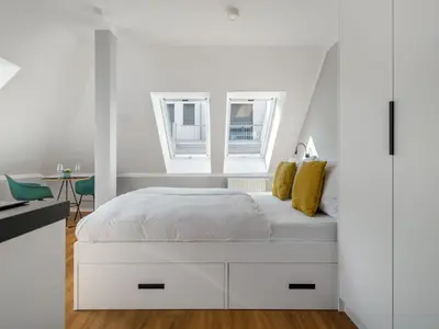 Ein Bett oder Betten in einem Zimmer der Unterkunft Numa Munich Munico