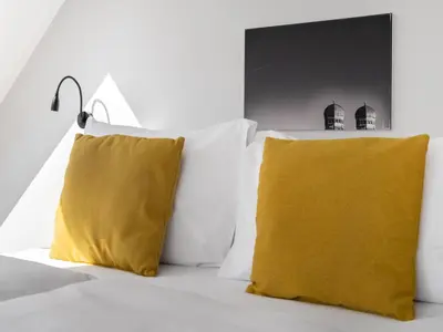 Ein Bett oder Betten in einem Zimmer der Unterkunft Numa Munich Munico