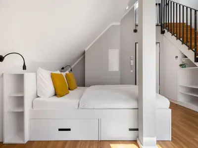 Ein Bett oder Betten in einem Zimmer der Unterkunft Numa Munich Munico