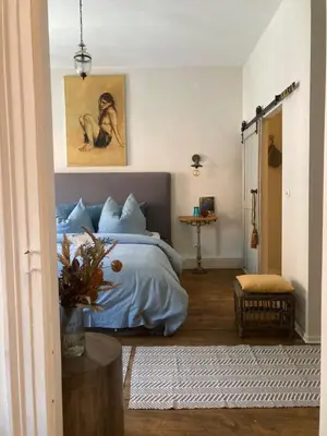 Ein Bett oder Betten in einem Zimmer der Unterkunft Pension Chapeau