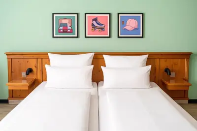 Ein Bett oder Betten in einem Zimmer der Unterkunft Garner Hotel Munich - Messe by IHG