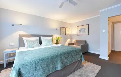 Ein Bett oder Betten in einem Zimmer der Unterkunft Hotel Admiral