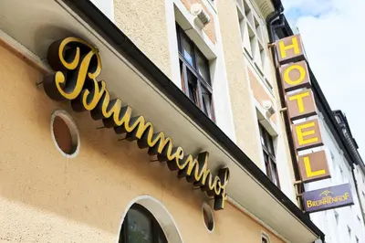 Ein Zertifikat, Auszeichnung, Logo oder anderes Dokument, das in der Unterkunft Brunnenhof City Center ausgestellt ist