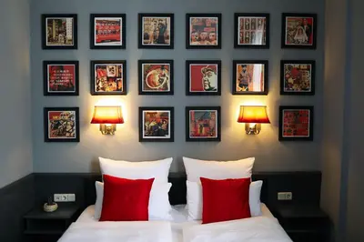 Ein Bett oder Betten in einem Zimmer der Unterkunft Boutique Hotel Krone München