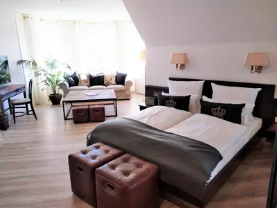 Ein Bett oder Betten in einem Zimmer der Unterkunft Boutique Hotel Krone München