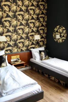 Ein Bett oder Betten in einem Zimmer der Unterkunft Boutique Hotel Krone München