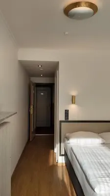 Ein Bett oder Betten in einem Zimmer der Unterkunft Hotel Aurbacher Hof GmbH