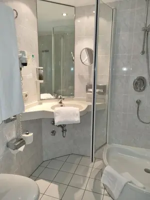 Ein Badezimmer in der Unterkunft myMINGA13 - Hotel & serviced Apartments