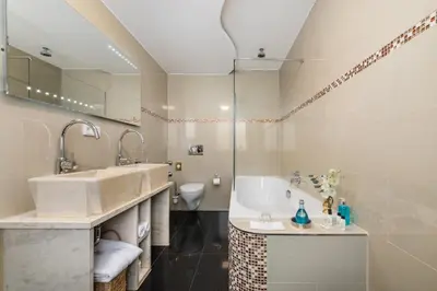 Ein Badezimmer in der Unterkunft Hôtel du Train