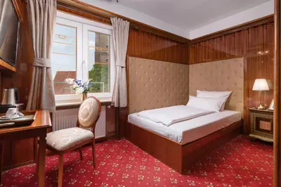Ein Bett oder Betten in einem Zimmer der Unterkunft Hôtel du Train