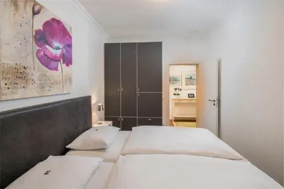Ein Bett oder Betten in einem Zimmer der Unterkunft Hotel Am Nockherberg