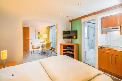 Ein Bett oder Betten in einem Zimmer der Unterkunft Hotel Am Nockherberg